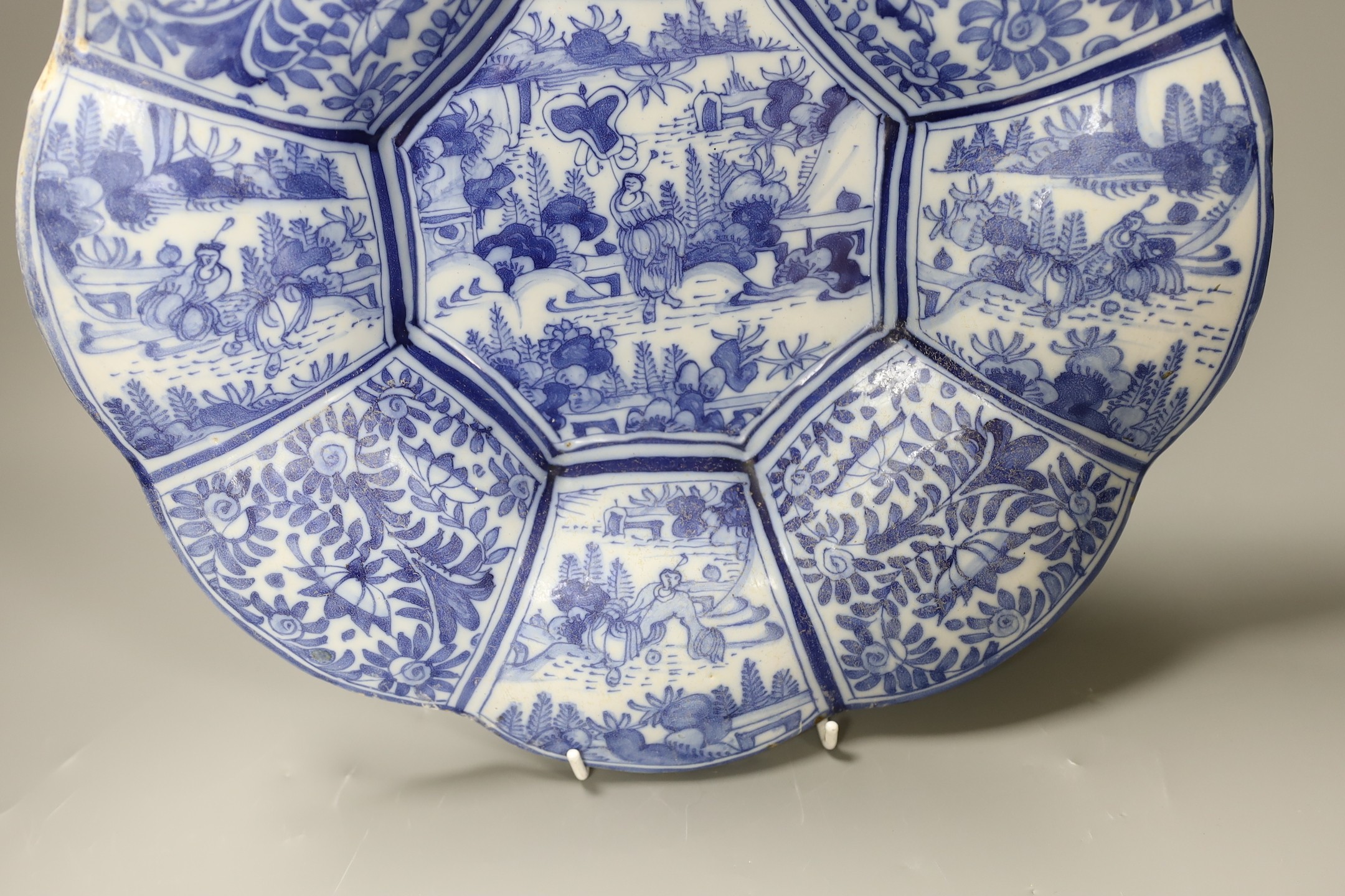 A Delft blue and white chinoiserie lobed dish, c.1700, 35cm diameter